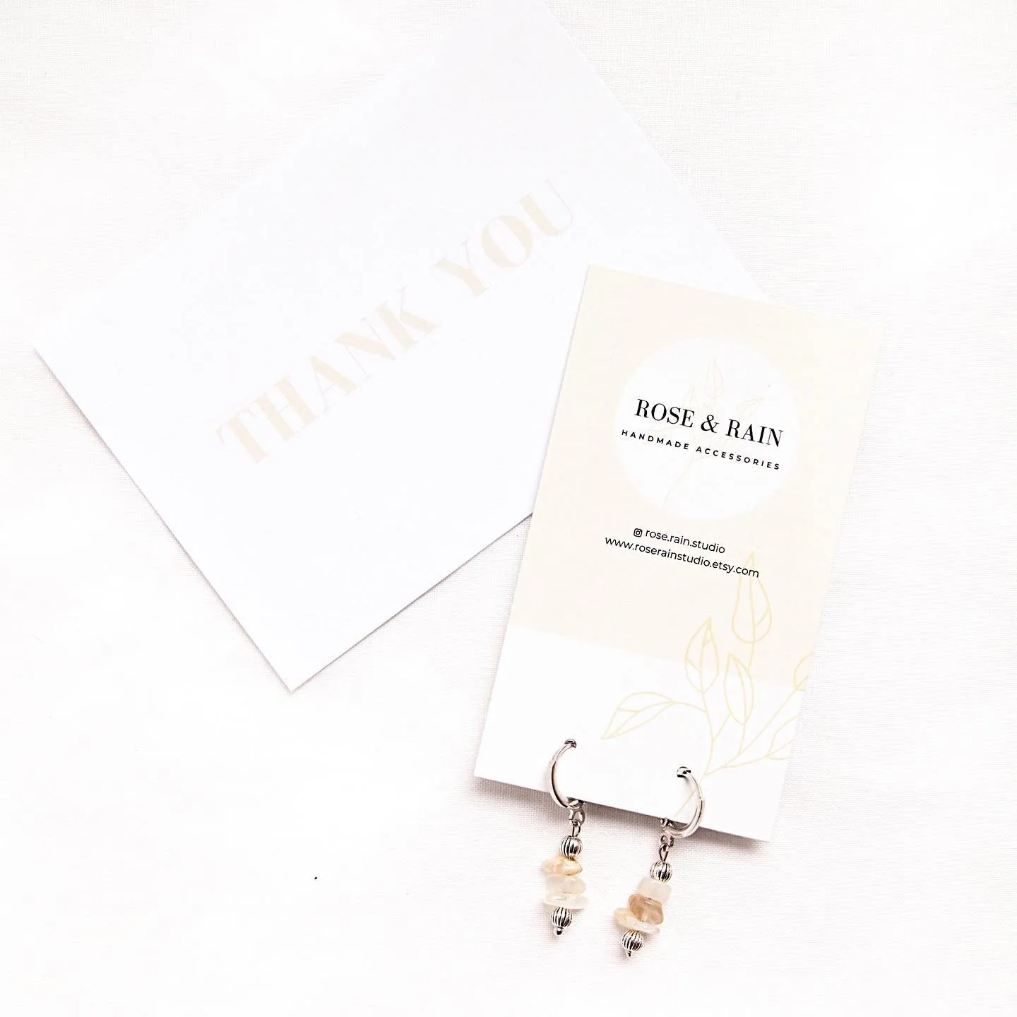 LILY MOONSTONE HUGGIE EARRINGS IN PLATINUM